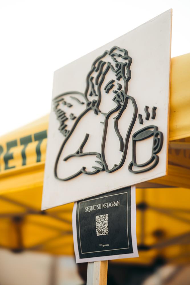 L'insegna del putto con la tazzina a un evento